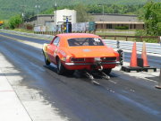 Orange CAMARO on the wheelie bars